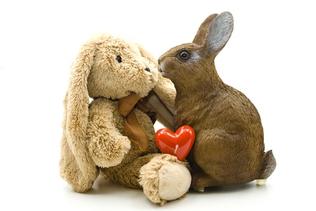Easter bunny with heart candleの写真素材