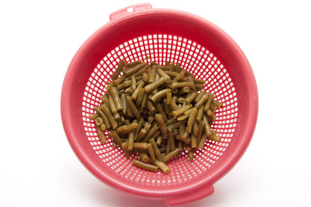 Cut of beans in the culinary sieve