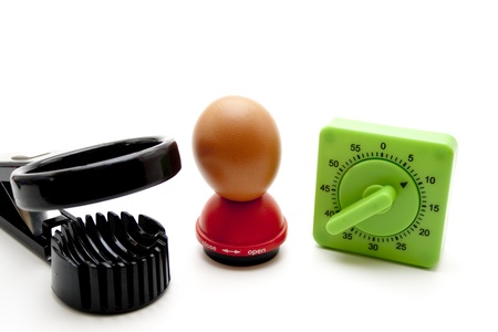 Egg timer with egg and egg slicerの写真素材