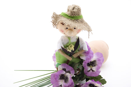 Floral decoration with straw dollの写真素材