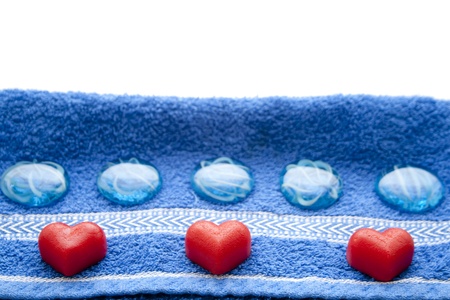Glass stones and marzipan heartの写真素材