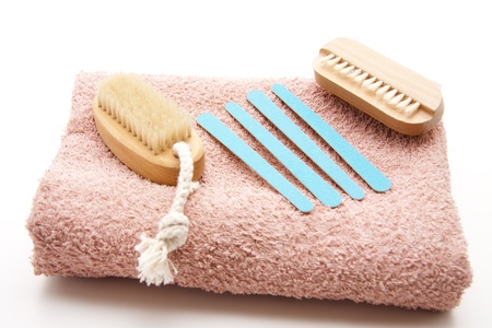 Nail arrows with nailbrush and hand clothの写真素材