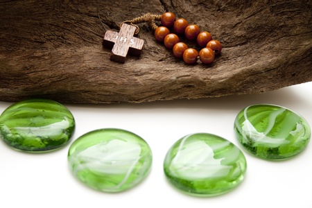 Wooden cross with glass stonesの写真素材