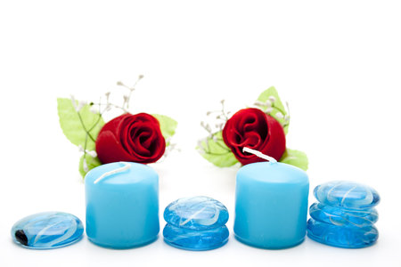 Wax candles with glass stones and roseの写真素材