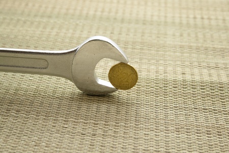 Screws key with moneyの写真素材