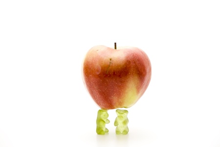 Little elastic bears carry appleの写真素材