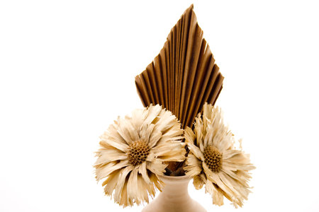Flowers vase with straw flower