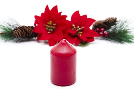 Christmas star with red candleの写真素材