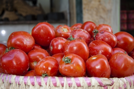 Tomatoes in the basketの写真素材