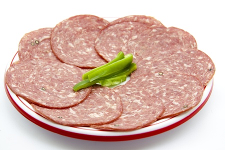 Fresh salamis with paprika の写真素材