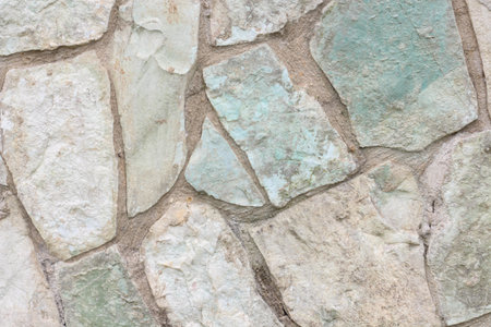 Horizontal background of big natural stones in pastel colors