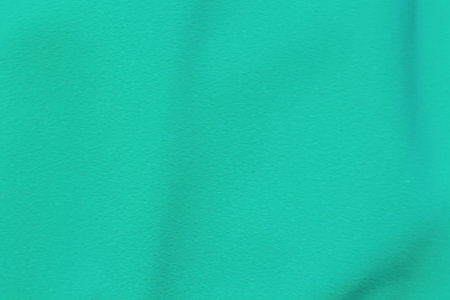 Grunge green background with shadow silhouette . Trendy color horizontal background