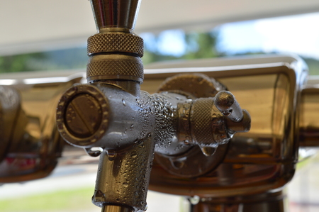 detail of tap beer pub in summerの写真素材
