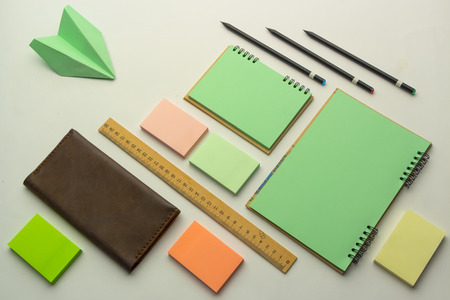 Modern samples of stationery, notebooks, stickers and pencils.の写真素材