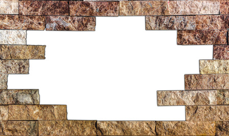 The wall of natural stone, grunge frame, white backgroundの写真素材