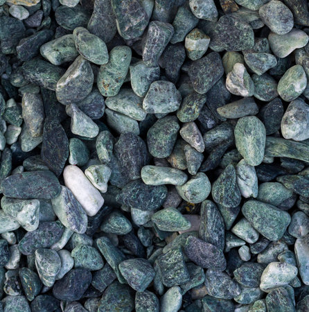 A sample of gravel from travertine and marble, used in landscape design to create a garden of stonesの写真素材