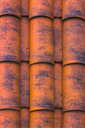 Red plastic roof tiles homeの写真素材