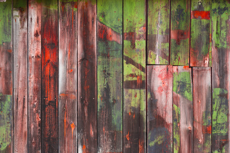 Abstract background of old worn wooden boards of different colors close upの写真素材