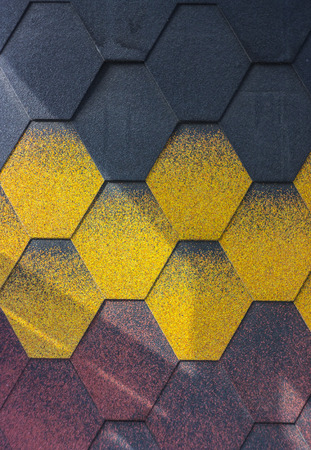 Red plastic roof tiles home texture close upの写真素材