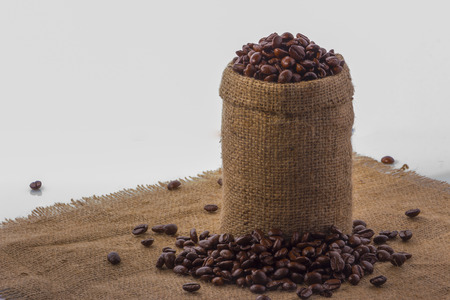 Coffee in a bag of deregie, on a yellow thick fabric.の写真素材