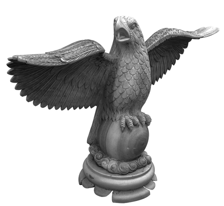 Eagle carved from white marble. Isolated on white close-upの写真素材