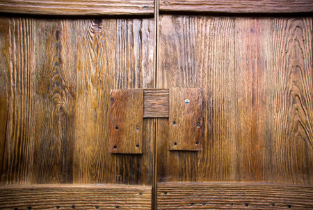 Brown wood plank wall texture background close up
