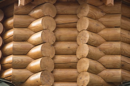 Natural background pattern of a log wall close upの写真素材