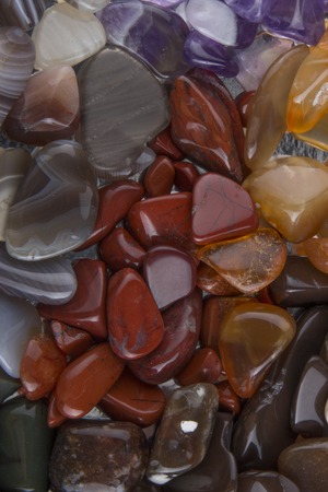 background from multicolored polished stones background rextureの写真素材