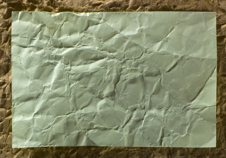 Green crepe Wrinkled Paper Texture background abstract.の写真素材
