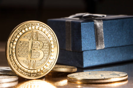 Bitcoin btc cryptocurrency and gift box btc golden coin as symbol of electronic virtual.の写真素材