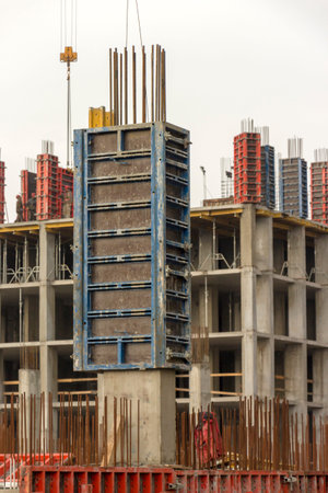 reinforced concrete wall of a multi-storey building in the process of construction.