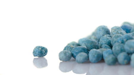 Heap of mineral fertilizers, isolated on the white backgroundの写真素材