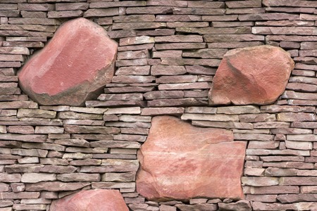Seamless stone masonry using rectangular stones, red and gray shadesの写真素材