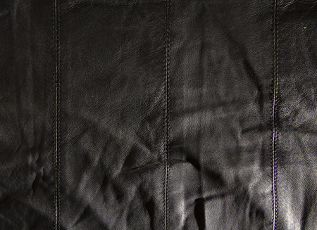 black leather background, useful for design works close upの写真素材
