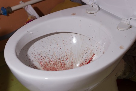 Toilet bowl with blood for halloween close upの写真素材