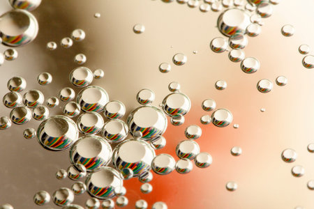 Close up Water drops with Rainbow colorful backgroundの写真素材