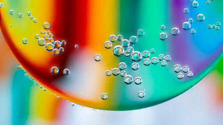Close up Water drops with Rainbow colorful background