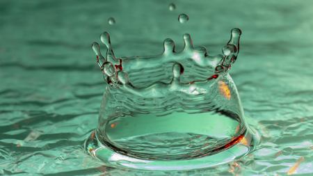 Drops of rain fall into the water, selective focus close upの写真素材