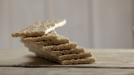 Sliced Oatmeal Bread on old Wooden Table close upの写真素材