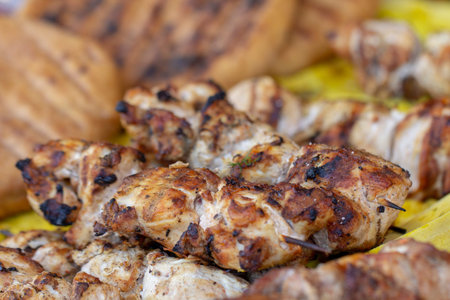 Street food, grilled meat on a spit. Homemade. Close up