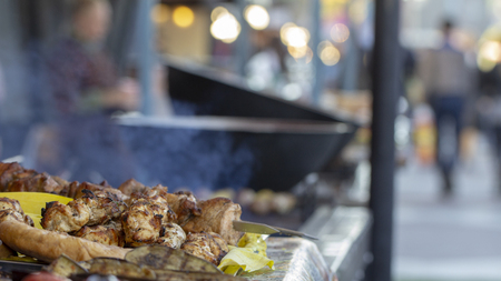 Street food, grilled meat on a spit. Homemade. Close upの写真素材