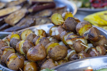 Golden roasted potatoes cooked on a grill, Potato Grilled Dishの写真素材