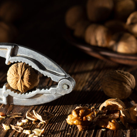 Shelled walnuts. On a wooden table. Top view close up