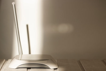 isolated white access point on table in office close up