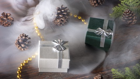 New Year's background with gifts, conifer branches. Copy spaceの写真素材
