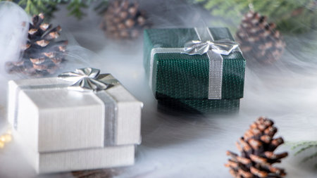 New Year's background with gifts, conifer branches. Copy space