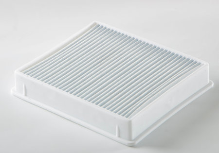 dirty dust filter. vacuum cleaner filter on white background
