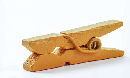 Colorful wooden clothespins on white background close upの写真素材