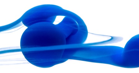 Abstract pattern falling into the water drop of red ink close upの写真素材