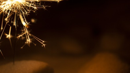 Christmas sparkler isolated on black background. Bengal fire close upの写真素材